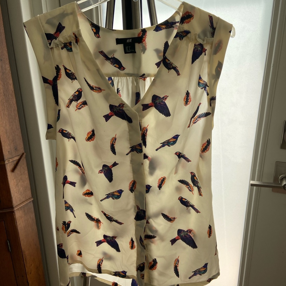 H&M sleeveless V neck bird blouse